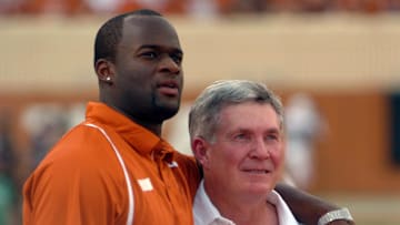 August 30, 2008; Austin, TX, USA; Tennessee Titans quarterback and former Texas Longhorn player Vince Young hugs Texas Longhorns head coach Mack Brown prior to a game against the Florida Atlantic University Owls at Darrell K Royal-Texas Memorial Stadium. Mandatory Credit: Brendan Maloney-Imagn Images