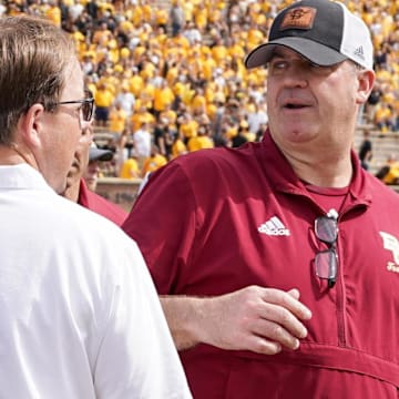 Sep 14, 2024; Columbia, Missouri, USA; Missouri Tigers head coach Eli Drinkwitz talks with Boston College Eagles head coach Bill O'Brien after the game at Faurot Field at Memorial Stadium. Mandatory Credit: Denny Medley-Imagn Images