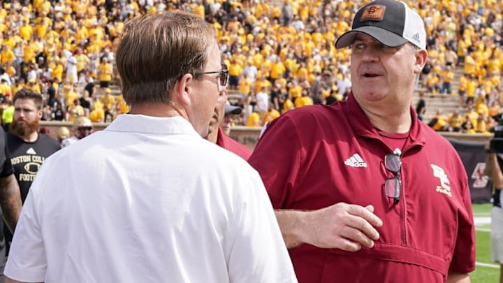 Sep 14, 2024; Columbia, Missouri, USA; Missouri Tigers head coach Eli Drinkwitz talks with Boston College Eagles head coach Bill O'Brien after the game at Faurot Field at Memorial Stadium. Mandatory Credit: Denny Medley-Imagn Images