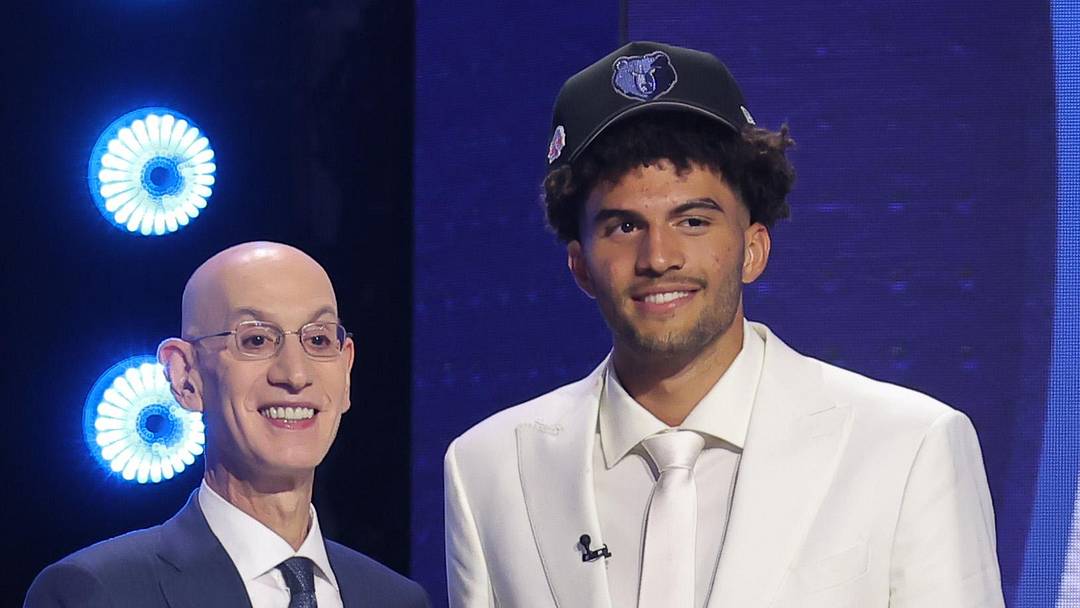 Jun 23, 2026; New York, NY, USA; NBA commissioner Adam Silver greets the third pick in the 2026 NBA draft, Duke forward Cameron Boozer after he was selected by the Memphis Grizzlies at Barclays Center. Mandatory Credit: Brad Penner-Imagn Images