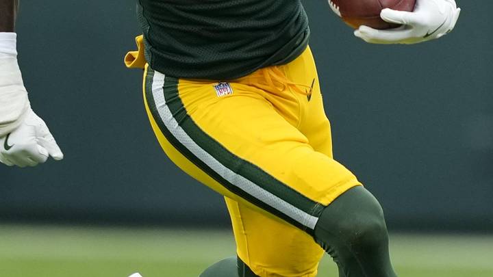 Nov 23, 2025; Green Bay, Wisconsin, USA; Green Bay Packers wide receiver Romeo Doubs (87) carries the ball Minnesota Vikings during the second half at Lambeau Field. Mandatory Credit: Kayla Wolf-Imagn Images