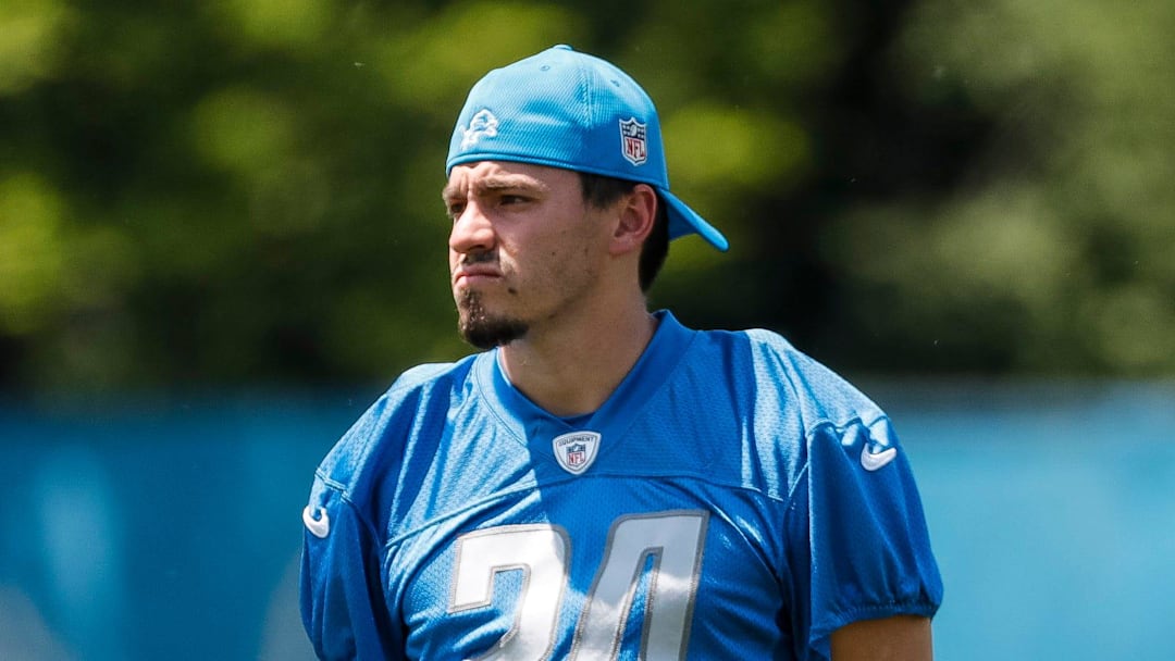 Detroit Lions place kicker John Parker Romo (24) watches practice during OTAs at Detroit Lions headquarters in Allen Park on Thursday, June 1, 2023.