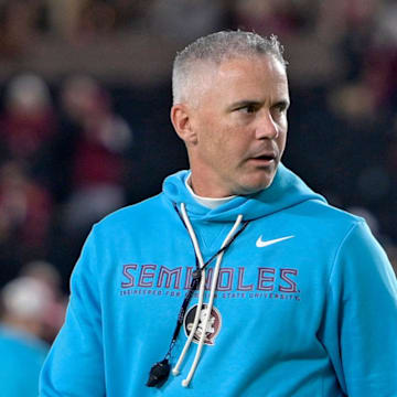 Nov 1, 2025; Tallahassee, Florida, USA; Florida State Seminoles head coach Mike Norvell walks on the field before the game against the Wake Forest Demon Deacons at Doak S. Campbell Stadium. Mandatory Credit: Melina Myers-Imagn Images