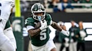 Michigan State's Makhi Frazier runs for a gain against Penn State during the first quarter on Saturday, Nov. 15, 2025, at Spartan Stadium in East Lansing.