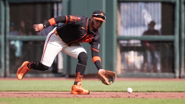 Jul 13, 2024; San Francisco, California, USA; San Francisco Giants second base Thairo Estrada (39) fields a ground ball during the second inning of the game against the Minnesota Twins at Oracle Park. 