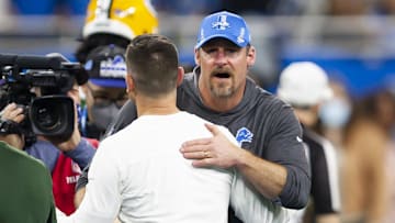 Jan 9, 2022; Detroit, Michigan, USA; Detroit Lions head coach Dan Campbell hugs Green Bay Packers head coach Matt LaFleur after the game at Ford Field. Mandatory Credit: Raj Mehta-Imagn Images