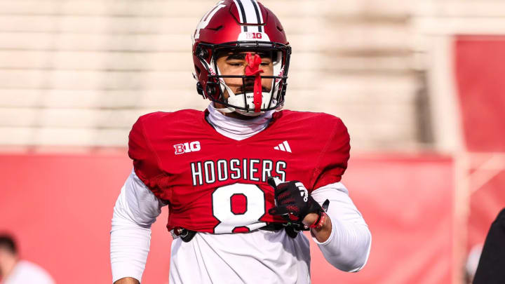 Indiana wide receiver Elijah Sarratt warms up during spring practice at Memorial Stadium.