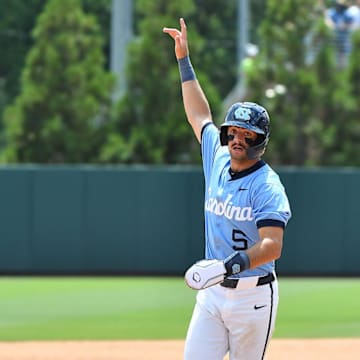 North Carolina's Gavin Gallaher (5) reacts to the home run against Arizona hit by Tyson Bass (11) in the seventh inning. The North Carolina Tarheels and the Arizona Wildcats met in game two of the NCAA Division 1 Super Regionals in Chapel Hill, N.C. on June 7, 2025.