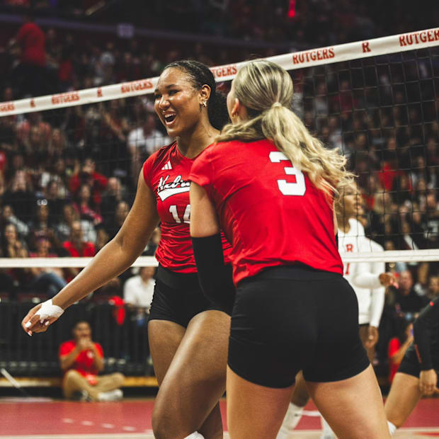 Manaia Ogbechie celebrates with Allie Sczech in the third set against Rutgers