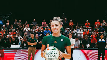 Haley Cavinder celebrating the her career achievement of 2500 points before the game against FSU.