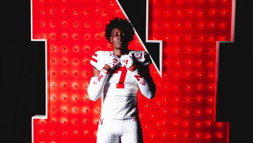 Nebraska football commit Jeremiah Jones wearing a Nebraska uniform in his commitment post.