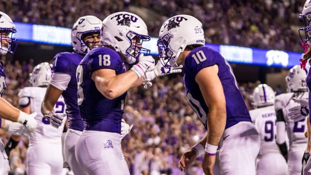 TCU's Josh Hoover and Ed Small celebrate a touchdown in their win over ACU.