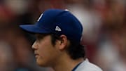 Los Angeles Dodgers designated hitter Shohei Ohtani (17) gestures at home plate in the third inning between Cincinnati Reds and Los Angeles Dodgers at Great American Ball Park in Cincinnati on July 30, 2025.