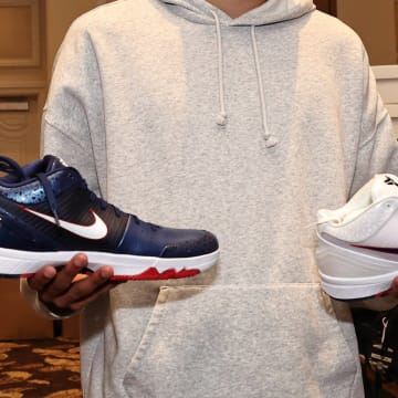 Tyrese Haliburton holds two pairs of the Nike Kobe 4.