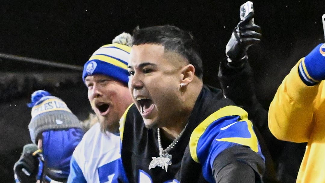 Jan 18, 2026; Chicago, IL, USA; Los Angeles Rams tight end Davis Allen (87) leaves the field as fans celebrate after the NFC Divisional Round game against the Chicago Bears at Soldier Field. Mandatory Credit: Matt Marton-Imagn Images