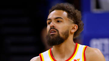 Trae Young #11 of the Atlanta Hawks dribbles against the Orlando Magic in the Play-In Tournament.