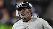 Oct 26, 2024; Boulder, Colorado, USA; Colorado Buffaloes head coach Deion Sanders walks the sidelines in the second half against the Cincinnati Bearcats at Folsom Field. Mandatory Credit: Ron Chenoy-Imagn Images