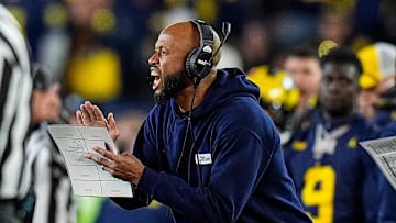 Michigan defensive backs coach LaMar Morgan reacts to a play against Oregon 