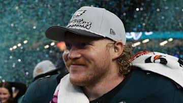 Philadelphia Eagles linebacker Jeremiah Trotter Jr. (54) celebrates with Eagles center Cam Jurgens (51) after Super Bowl LIX.