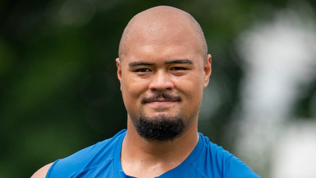 Newly drafted Lion Giovanni Manu walks off the field after he works out at practice with fellow offensive lineman on Tuesday, July 30, 2024 at the Lions practice facility in Allen Park. Newly drafted Lion Giovanni Manu walks off the field after he works out at practice with fellow offensive lineman on Tuesday, July 30, 2024 at the Lions practice facility in Allen Park.