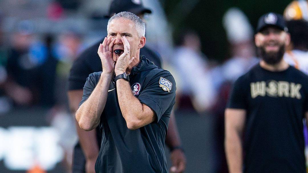 Florida State Seminoles head coach Mike Norvell leads warmups before the Seminoles take on the LSU Tigers on Sunday, Sept. 3, 2023 at Camping World Stadium.