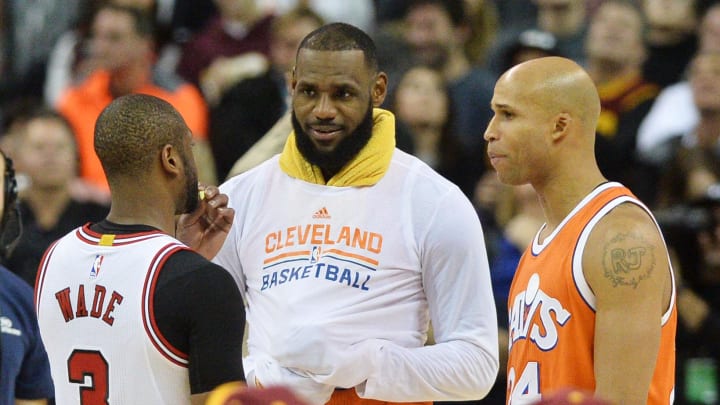 Jan 4, 2017; Cleveland, OH, USA; Chicago Bulls guard Dwyane Wade (3) talks with Cleveland Cavaliers forward LeBron James (23) and forward Richard Jefferson (24) during the second half at Quicken Loans Arena.