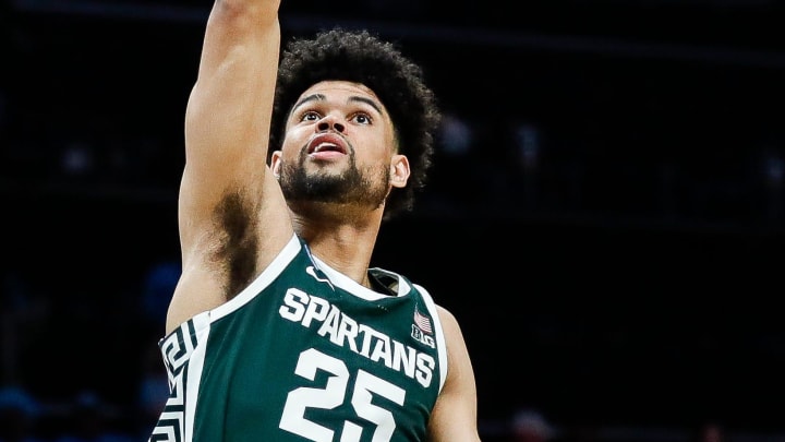 Michigan State forward Malik Hall (25) makes a layup against North Carolina during the second half of the NCAA tournament West Region second round at Spectrum Center in Charlotte, N.C. on Saturday, March 23, 2024.