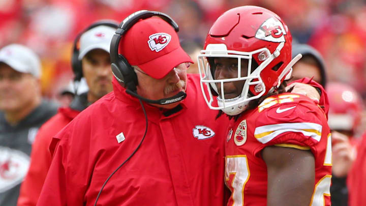 Oct 7, 2018; Kansas City, MO, USA; Kansas City Chiefs head coach Andy Reid talks with running back Kareem Hunt (27) in the second half against the Jacksonville Jaguars at Arrowhead Stadium. Mandatory Credit: Jay Biggerstaff-Imagn Images