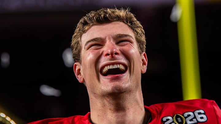 Indiana's Fernando Mendoza (15) smiles on the podium after the College Football Playoff National Championship college football game at Hard Rock Stadium in Miami Gardens on Monday, Jan. 19, 2026.