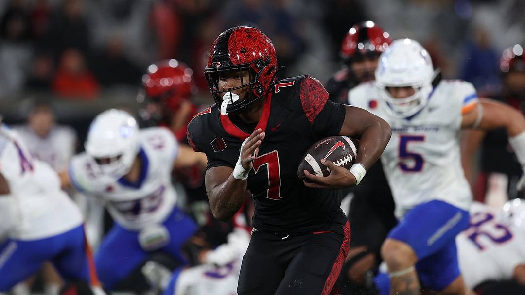San Diego State Aztecs running back Lucky Sutton (7). San Diego State Aztecs running back Lucky Sutton (7).