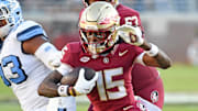 Nov 2, 2024; Tallahassee, Florida, USA;  Florida State Seminoes receiver Lawayne McCoy (15) runs the ball for a two point conversion against the North Carolina Tarheels in the first quarter at Doak S. Campbell Stadium. Mandatory Credit: Robert Myers-Imagn Images