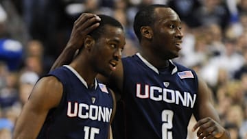 Feb 15, 2010; Philadelphia, PA, USA; Connecticut Huskies guards Kemba Walker (15) and Donnell Beverly (2) react after a call during the first half against the Villanova Wildcats at the Wachovia Center. Mandatory Credit: Howard Smith-Imagn Images