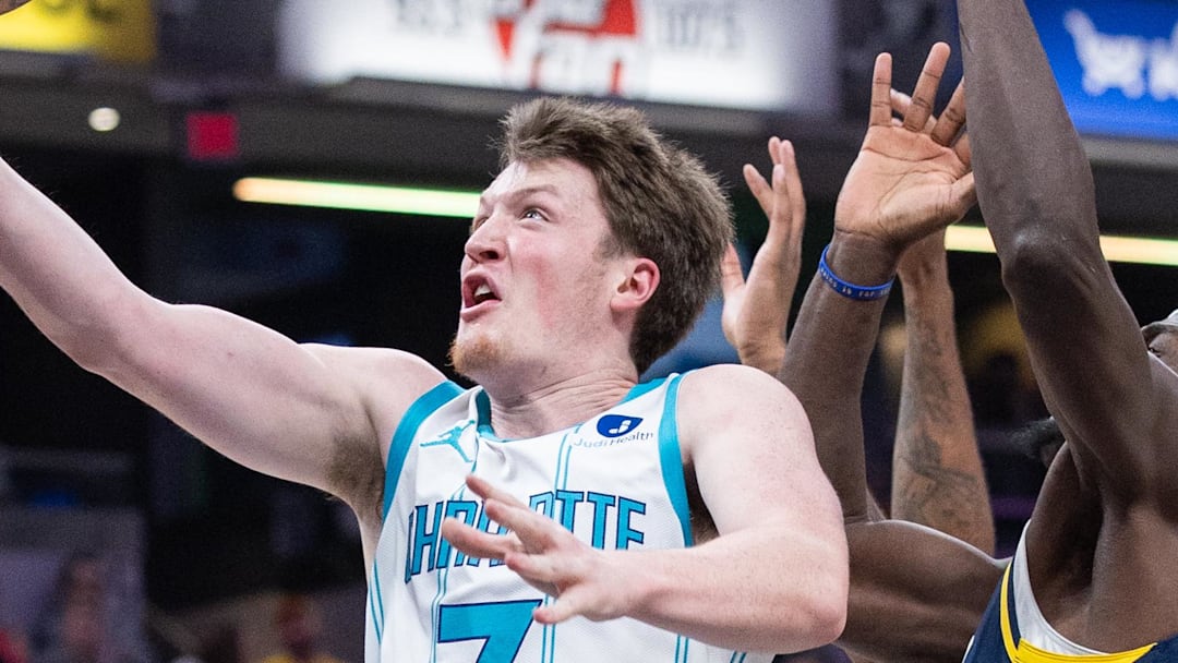 Nov 19, 2025; Indianapolis, Indiana, USA; Charlotte Hornets guard Kon Knueppel (7) shoots the ball while  Indiana Pacers forward Pascal Siakam (43) defends in the first half at Gainbridge Fieldhouse. Mandatory Credit: Trevor Ruszkowski-Imagn Images