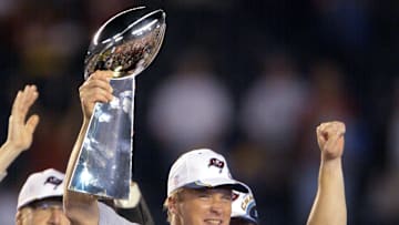 Tampa Bay Buccaneers head coach Jon Gruden holds up the Vince Lombardi Trophy after winning Super Bowl XXXVIII against the Oakland Raiders at Qualcomm Stadium in San Diego, CA on Jan. 26, 2003. 