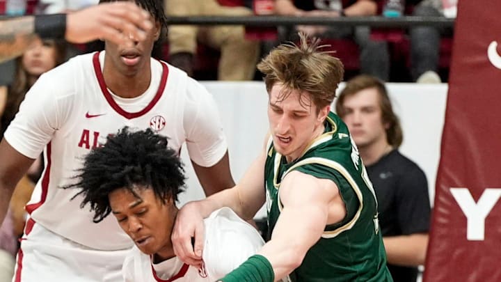 USF guard Joseph Pinion, shown here in the Bulls recent game at Alabama, set a personal record Sunday with seven 3-pointers in a blowout win over UMBC