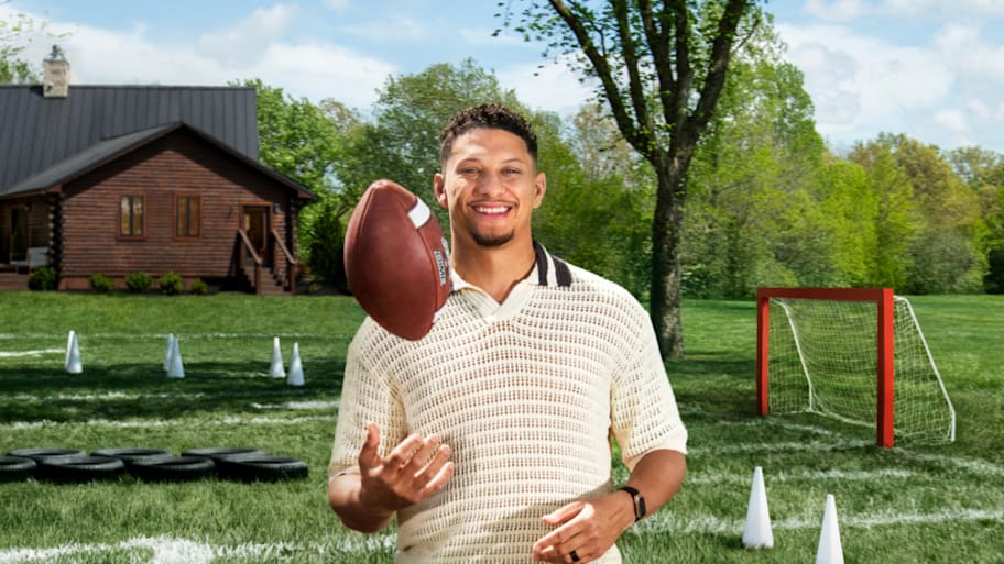 Patrick Mahomes tosses a football in the air. | Brian Finke/Airbnb