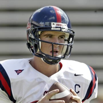 Oct 4, 2003; Gainesville, FL, USA: FILE PHOTO; Ole Miss Rebels quarterback (10) Eli Manning in action against the Florida Gators at Ben Hill Griffin Stadium. Mandatory Credit: Photo by Paul Chapman-USA TODAY Sports