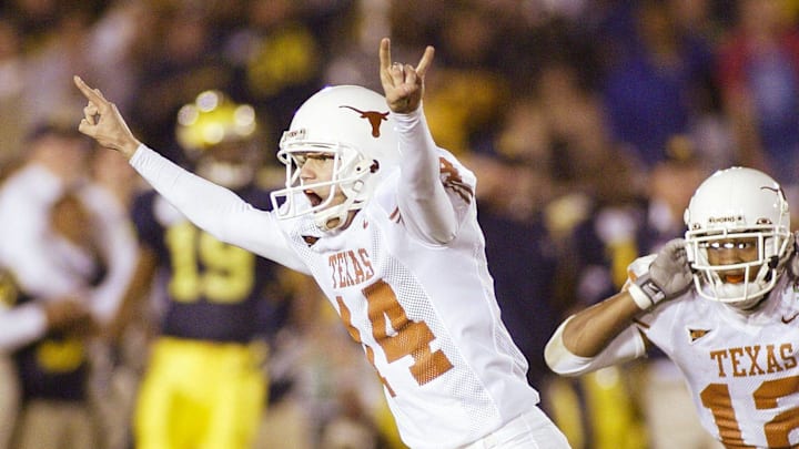 Jan 1, 2005; Pasadena, CA, USA: FILE PHOTO; Texas Longhorns kicker Dusty Mangum (14) and wide receiver Tony Jeffery (12) celebrates against the Michigan Wolverines Texas Longhorns during the 2005 Rose Bowl at the Rose Bowl. The Longhorns defeated the Wolverines 38-37. Mandatory Credit: Richard Mackson-USA TODAY Network

10 of the top games in Texas football history