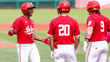 Indiana outfielder Devin Taylor (far left) is greeted by teammates Korbyn Dickerson (20) and Jake Stadler (9) during the weekend series against Maryland at Bart Kaufman Field.