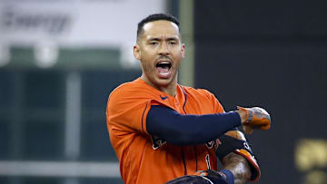 Houston Astros shortstop Carlos Correa (1) celebrates hitting