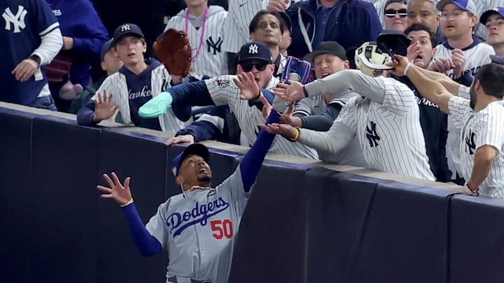 Mookie Betts jumps to make a catch during the Dodgers' 11–4 loss to the Yankees in Game 4 of the World Series on Oct. 29, 2024.