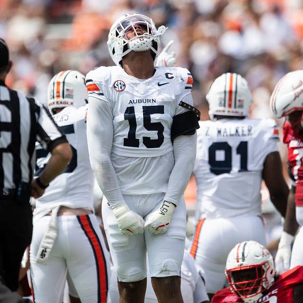 Auburn Tigers defensive end Keldric Faulk celebrates a stop as Auburn Tigers take on South Alabama Jaguars 