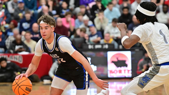 Quincy Blue Devils (IL) against the Washon Wolverines (IL) on January 4, 2025. Quincy Blue Devils (IL) against the Washon Wolverines (IL) on January 4, 2025.