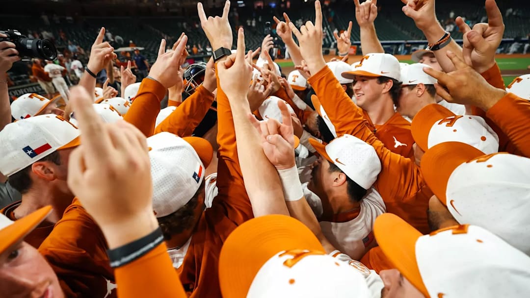 The Longhorns celebrate following a victory at the Bruce Bolt College Classic