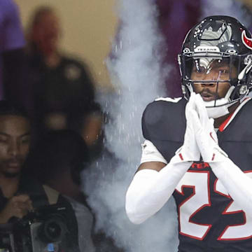Oct 27, 2024; Houston, Texas, USA; Houston Texans safety Eric Murray (23) walks onto the field before the game against the Indianapolis Colts at NRG Stadium. Mandatory Credit: Troy Taormina-Imagn Images