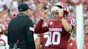 Oklahoma quarterback John Mateer, offensive coordinator Ben Arbuckle