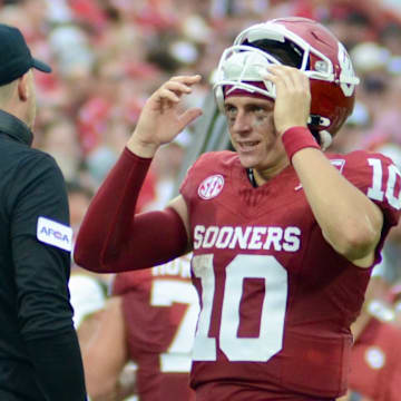 Oklahoma quarterback John Mateer, offensive coordinator Ben Arbuckle