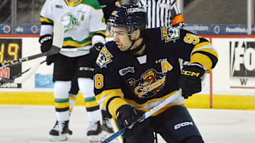 Erie Otters forward Pano Fimis moves the puck against the London Knights during an Ontario Hockey League hockey game at Erie Insurance Arena in Erie on March 13, 2024.