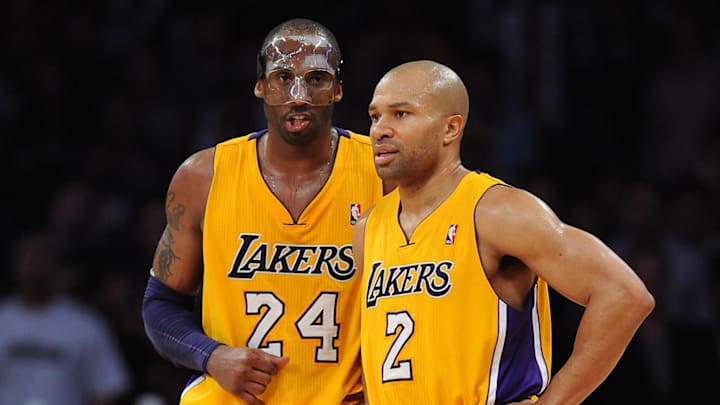 March 2, 2012; Los Angeles, CA, USA; Los Angeles Lakers shooting guard Kobe Bryant (24) talks with Los Angeles Lakers point guard Derek Fisher (2) during the second half of the game against the Sacramento Kings at the Staples Center. Mandatory Credit: Jayne Kamin-Oncea-Imagn Images