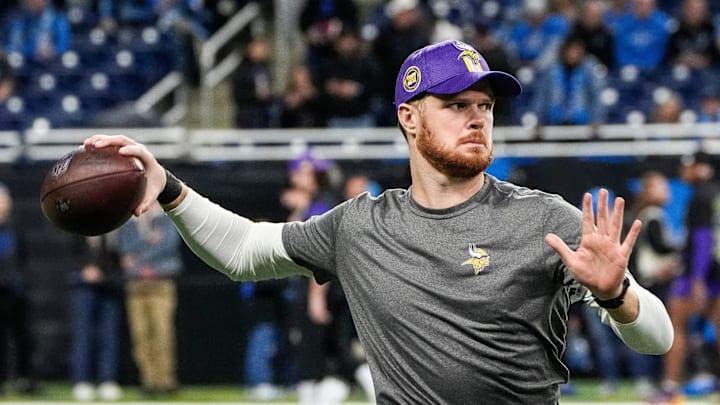 Minnesota Vikings quarterback Sam Darnold (14) warms up before the game between Detroit Lions and Minnesota Vikings at Ford Field in Detroit on Sunday, Jan. 5, 2025. Minnesota Vikings quarterback Sam Darnold (14) warms up before the game between Detroit Lions and Minnesota Vikings at Ford Field in Detroit on Sunday, Jan. 5, 2025.